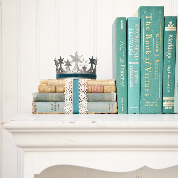 Distressed Crown and Bookshelf Propping Idea